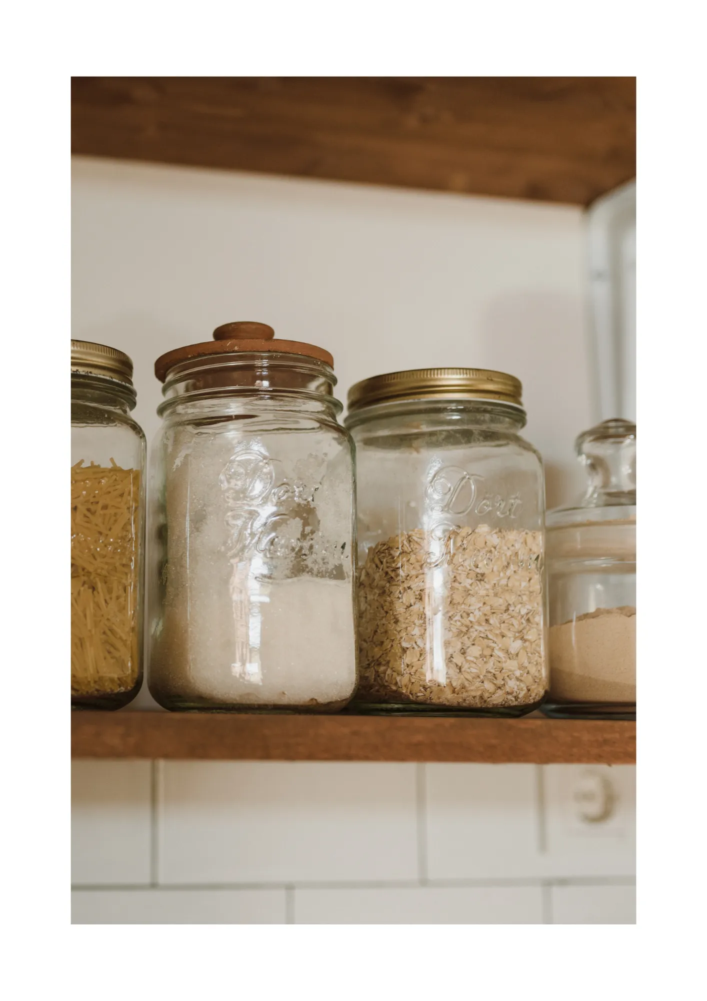 Organised pantry with glass jars